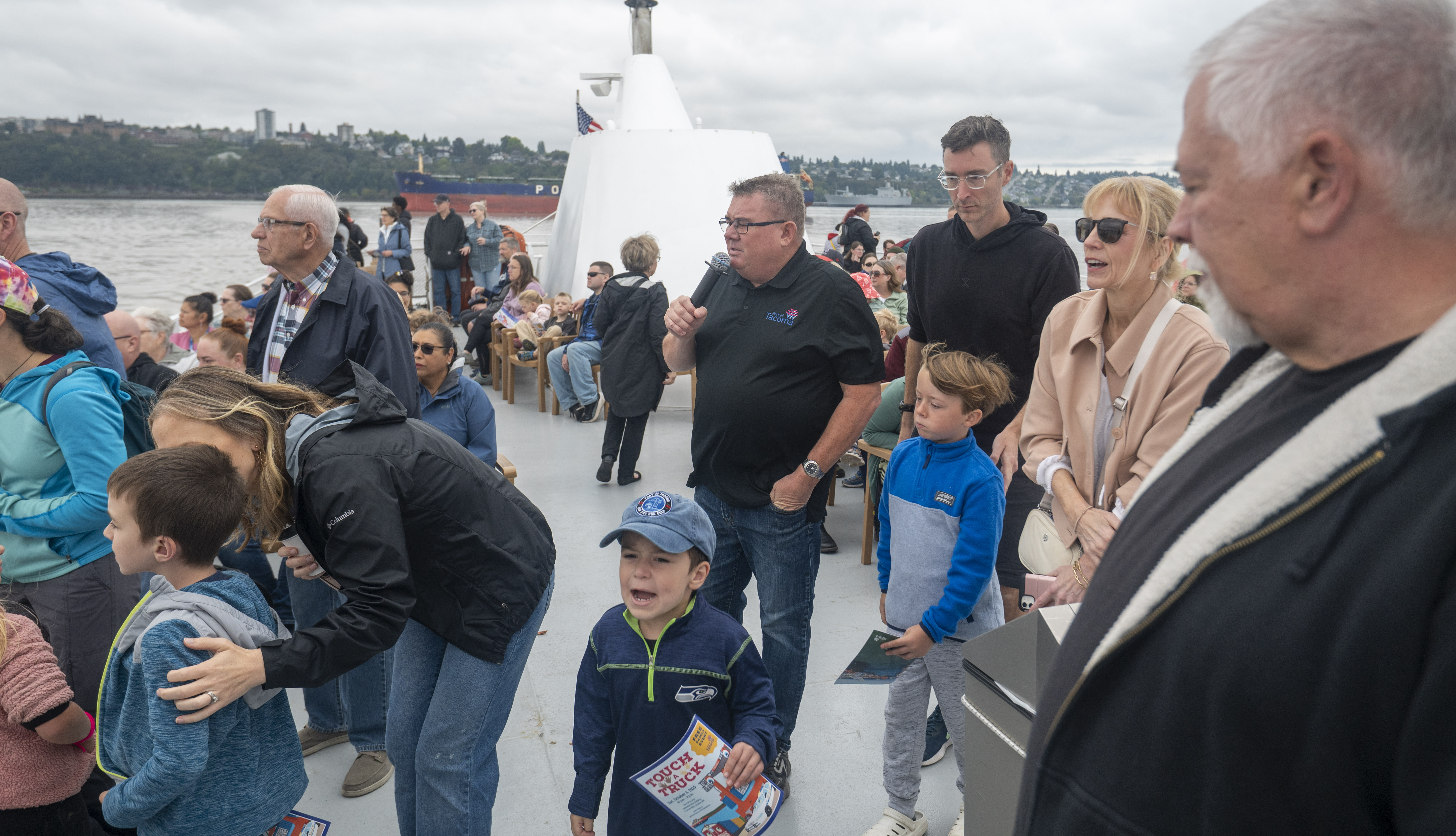Guests listen to their tour guide, Port Executive Director Eric Johnson