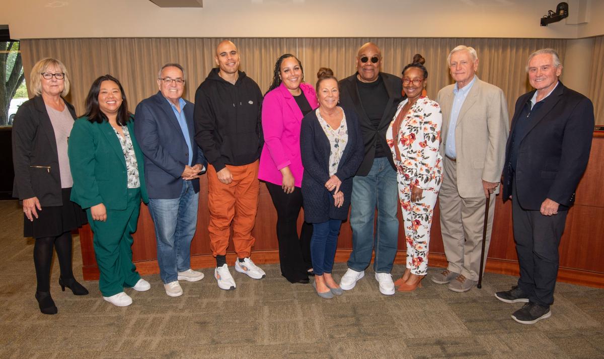 Louis Cooper Jr. and his family were honored by the Port of Tacoma Commission.